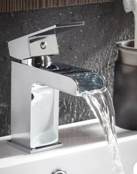 brass fittings, the elegant tap with flowing water
